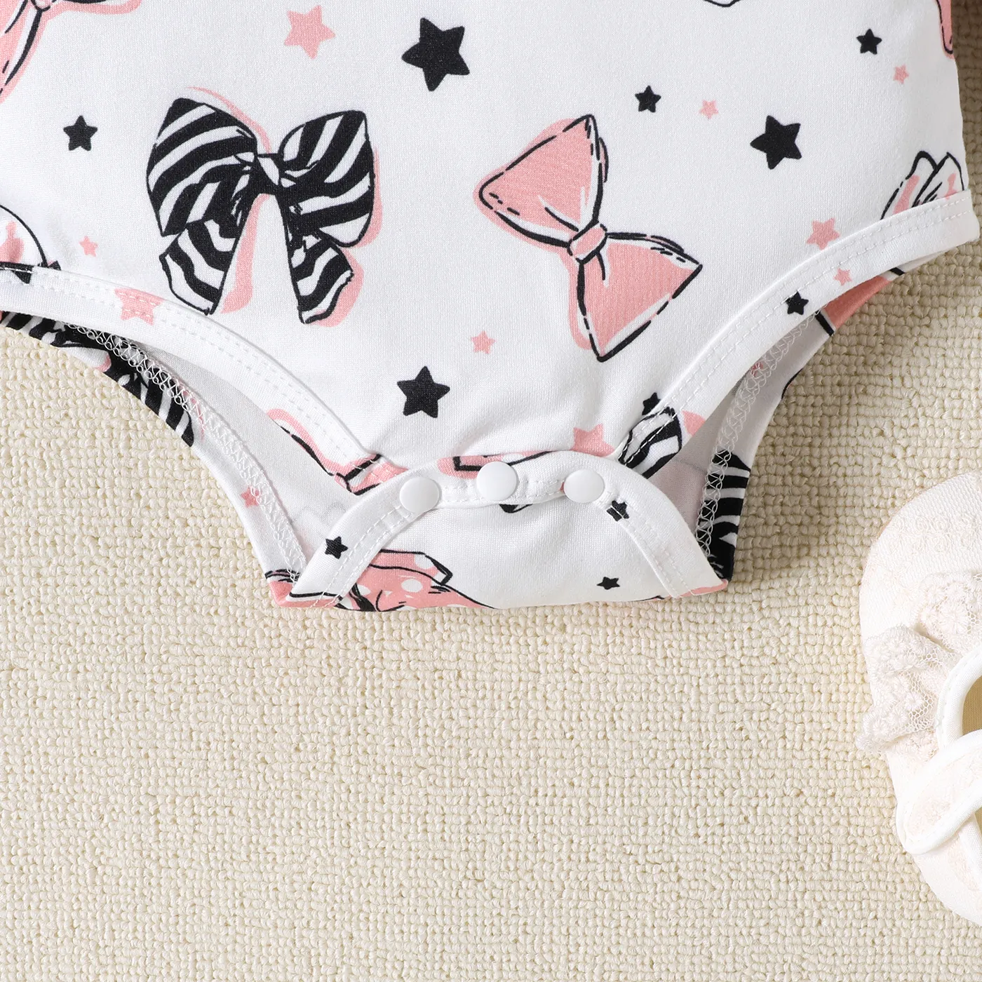 2pcs Baby Girl Allover Bowknot Print Ruffle Long-sleeve Romper and 100% Cotton Solid Bow Decor Skirt Set Pink image 6