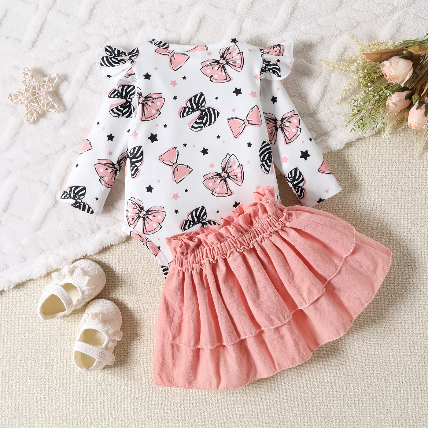 2pcs Baby Girl Allover Bowknot Print Ruffle Long-sleeve Romper and 100% Cotton Solid Bow Decor Skirt Set Pink image 2