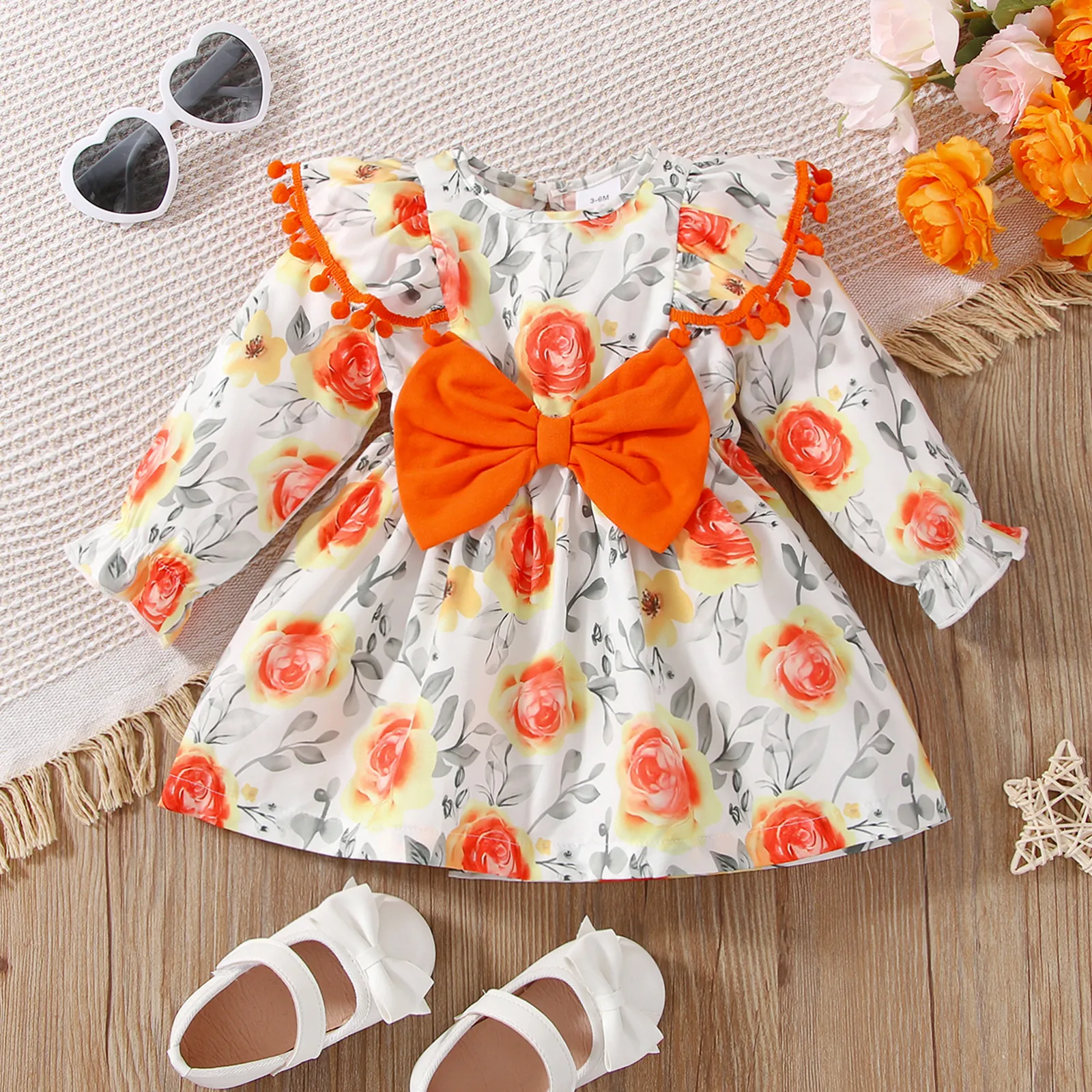 

Baby Girl Allover Floral Print Ruffle Trim Pom Poms Bow Decor Long-sleeve Dress