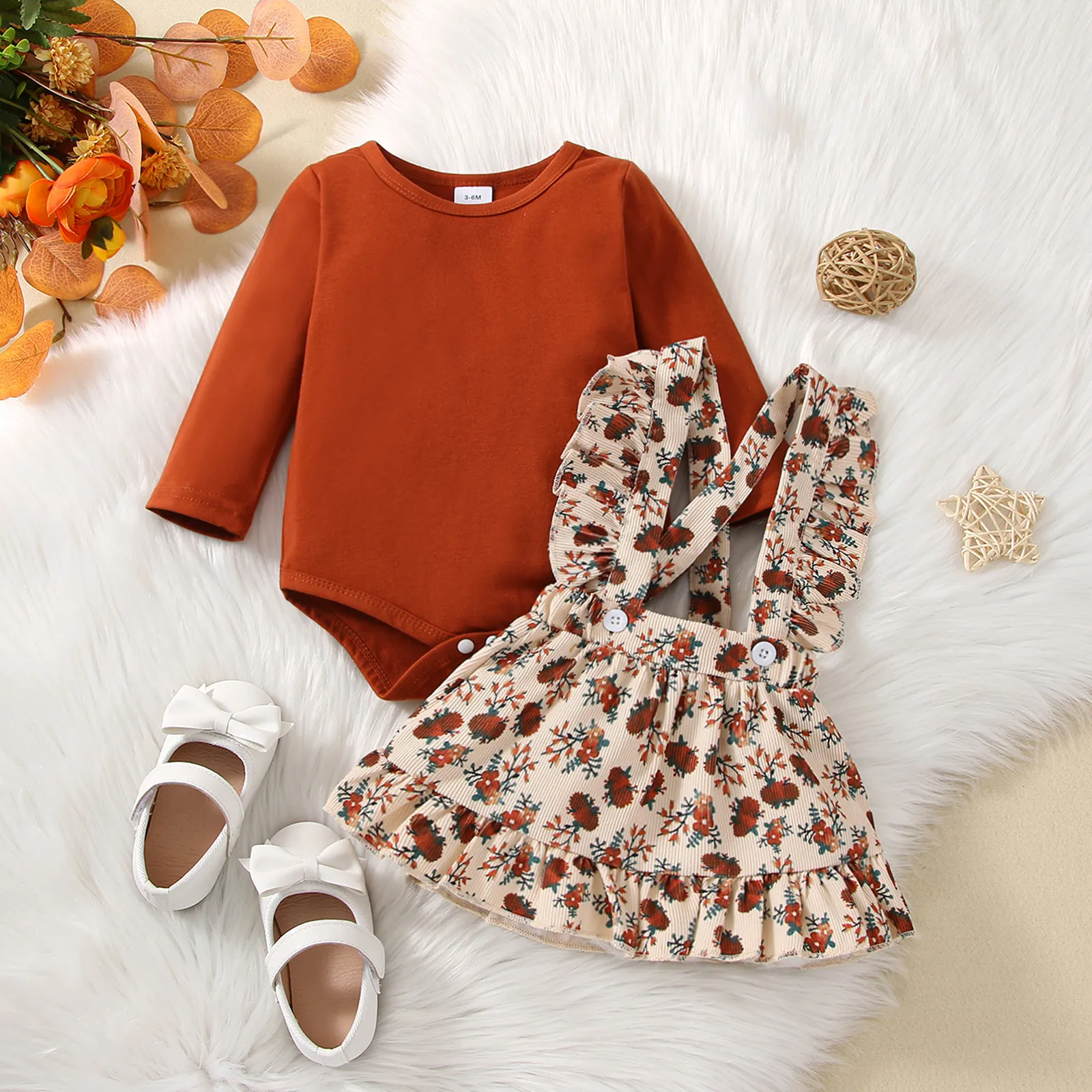 2pcs Baby Girl Solid Long-sleeve Romper and Allover Floral Print Ruffle Trim Suspender Skirt Set