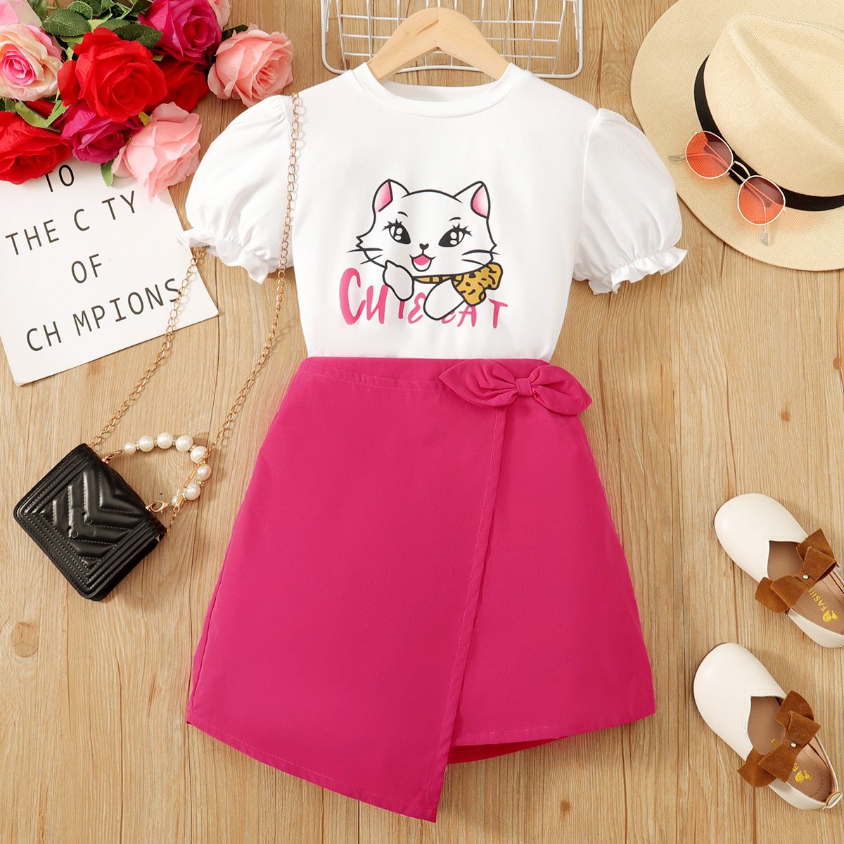 

2pcs Kid Girl Cat Print Puff-sleeve Top and Bowknot Decor Solid Skirt Set