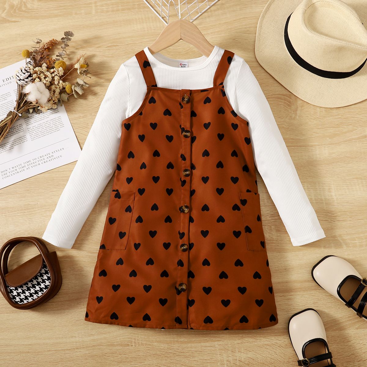 

2pcs Kid Girl Ribbed Long-sleeve Tee and Allover Heart Print Buttons Front Strappy Dress Set