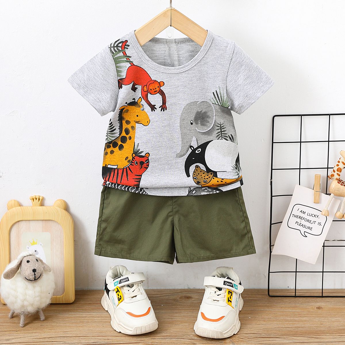 

2pcs Baby Boy 100% Cotton Solid Shorts and Allover Animal Print Short-sleeve T-shirt Set