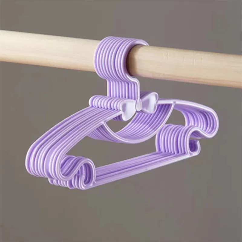 10 pacotes de cabides de bebê de plástico cabides de roupas antiderrapantes para lavanderia e armário Roxo Claro