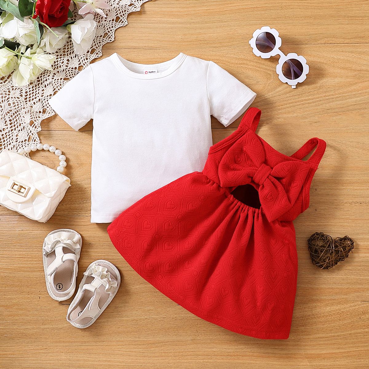 

2pcs Baby Girl 95% Cotton Short-sleeve Tee and Heart Textured Bow Front Cut Out Overall Dress Set