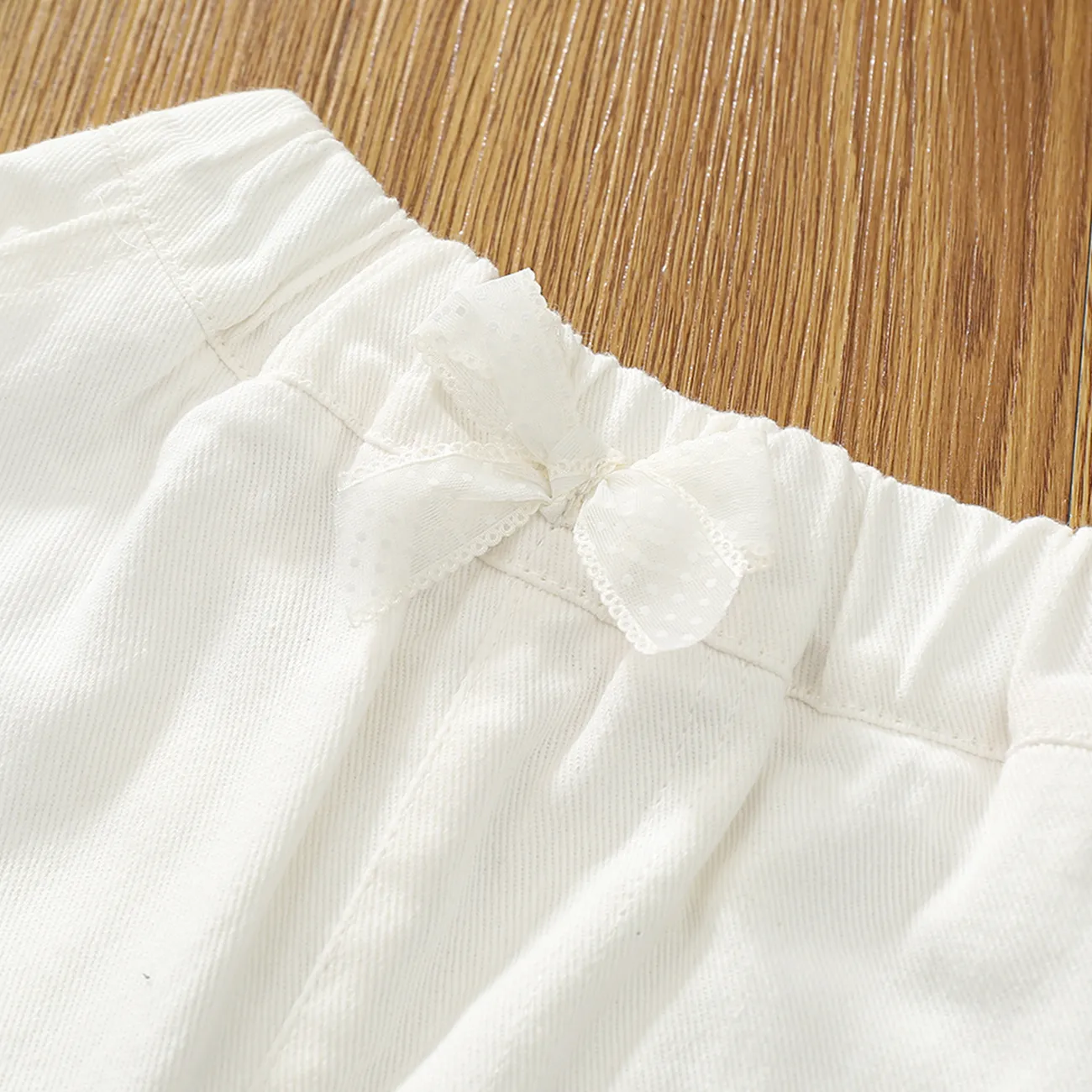 Kid Girl Bow Decor Pockets Ruffle Solid Denim Shorts White big image 1