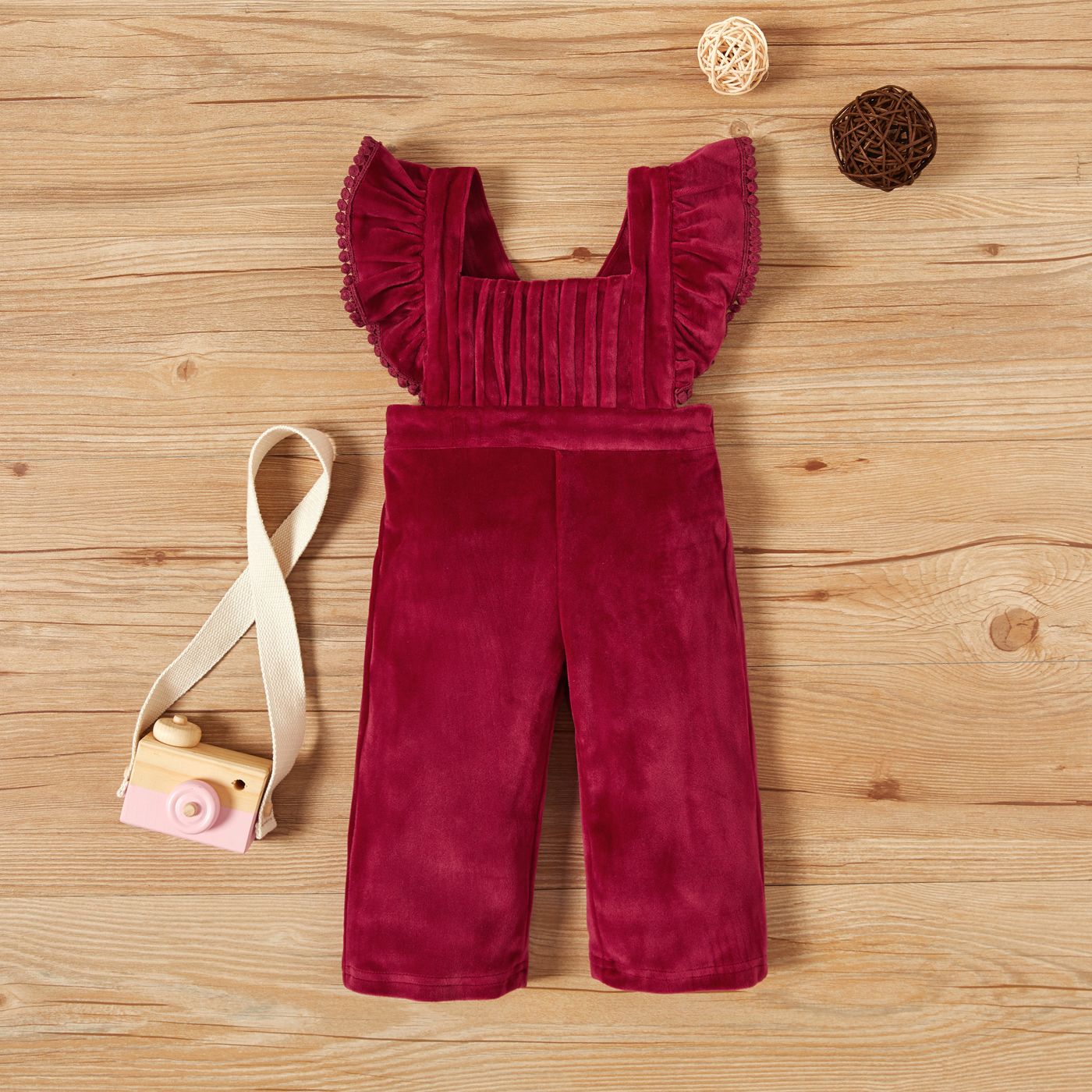 

Solid Velvet Ruffle and Tassel Decor Flutter-sleeve Baby Jumpsuit