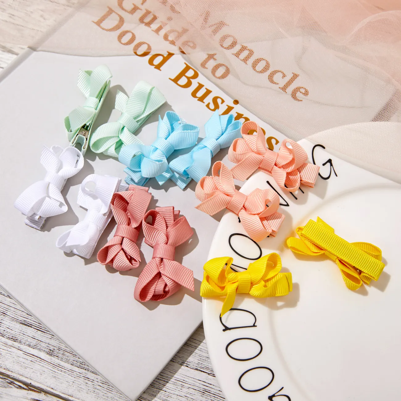 Pince à cheveux de décor de nœud papillon de 12 paquets pour filles (multicolore disponible) Multicolore big image 1