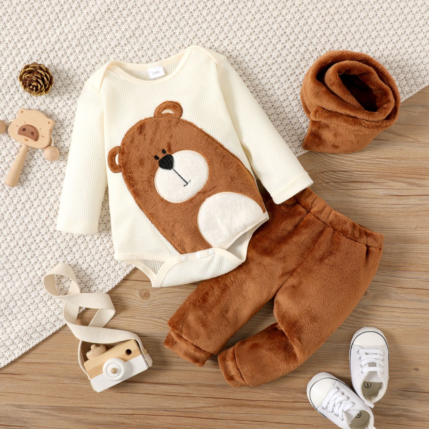 

3pcs Baby Boy/Girl Cartoon Bear Pattern Waffle Long-sleeve Romper and Brown Trousers with Scarf Set