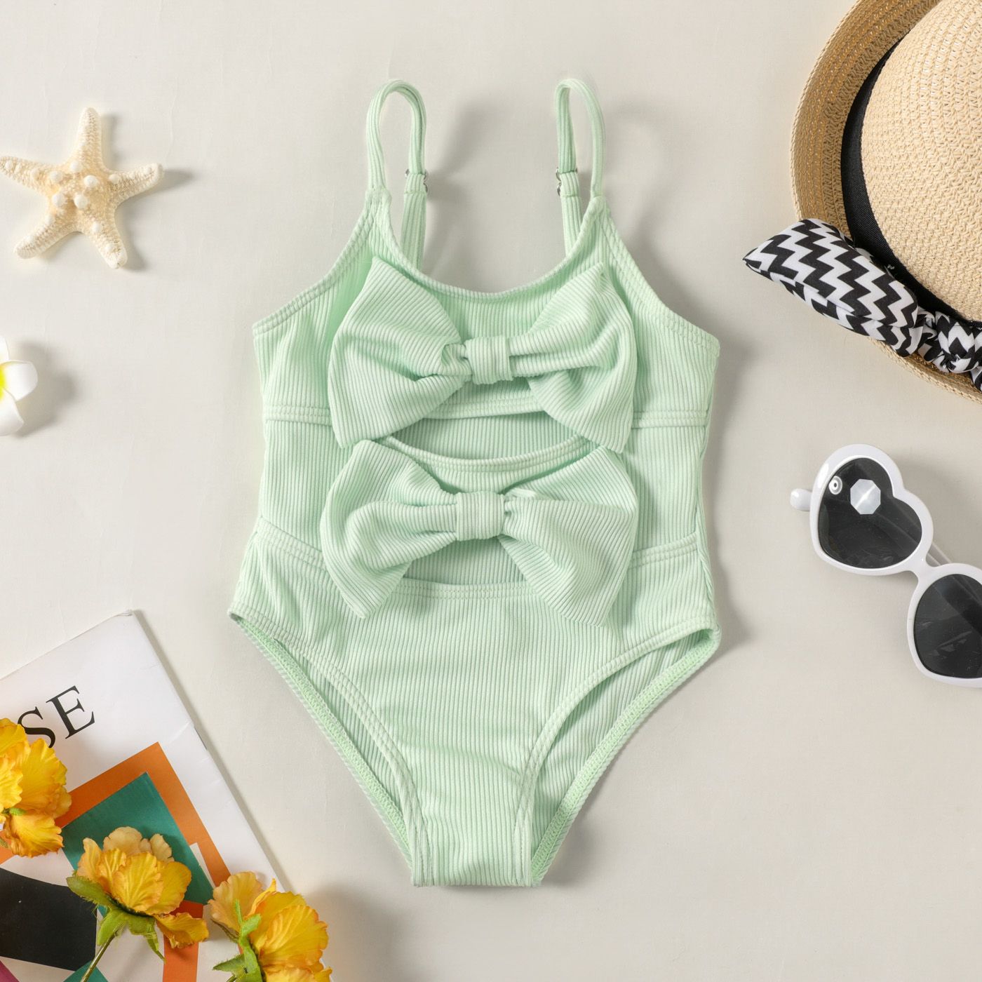 

Baby Girl Solid Ribbed Spaghetti Strap Bowknot Hollow Out One-Piece Swimsuit