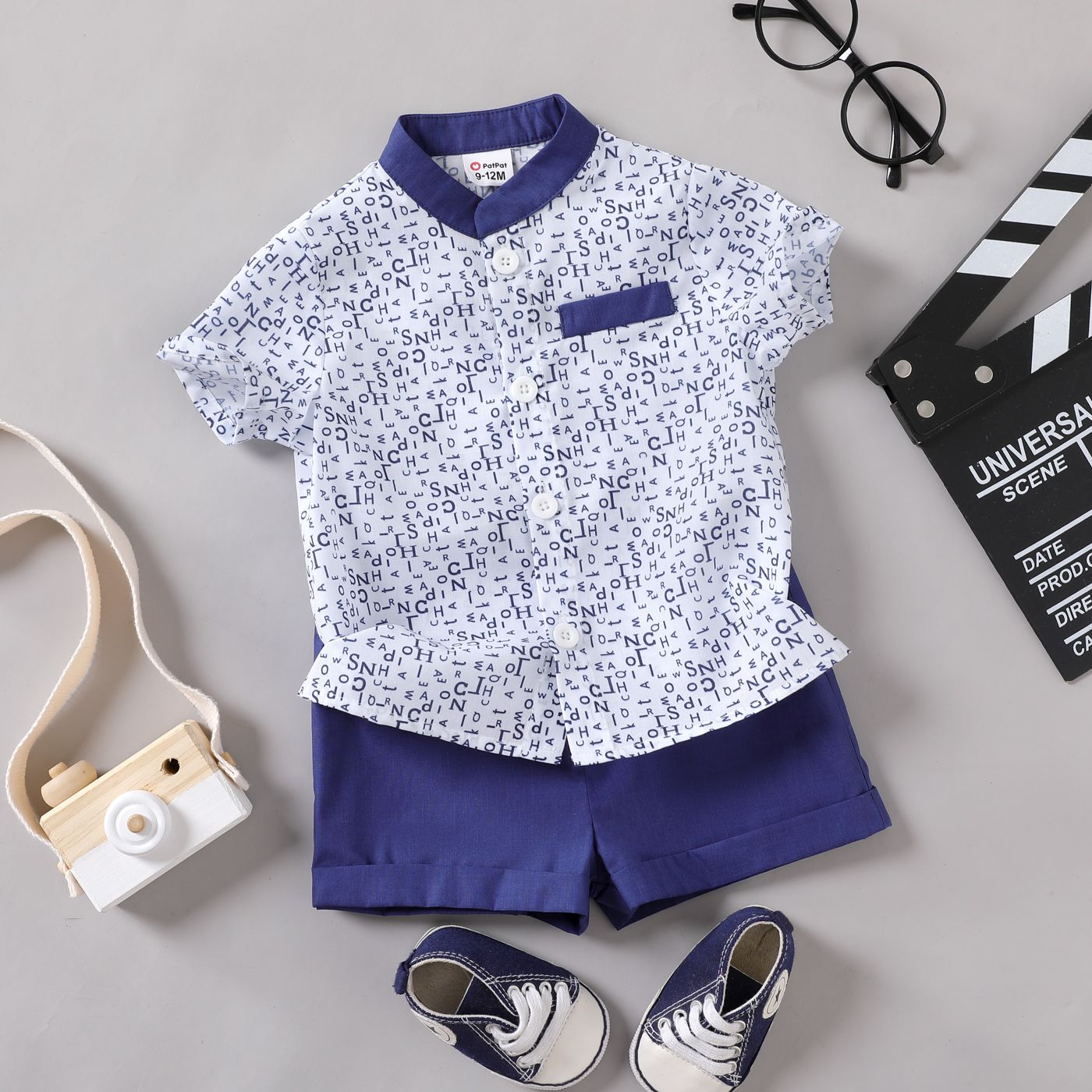 

2pcs Baby Boy All Over Letter Print Short-sleeve Button Up Shirt and Solid Shorts Set