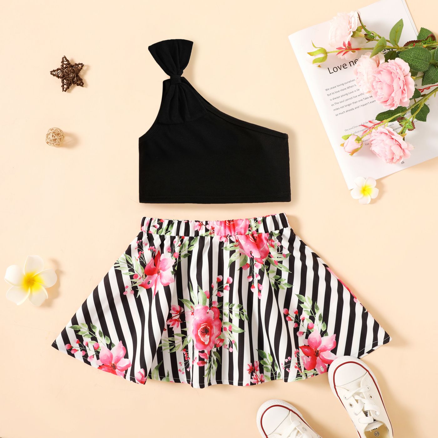 

2pcs Toddler Bowknot Design One Shoulder Black Tee and Floral Print Stripe Skirt Set