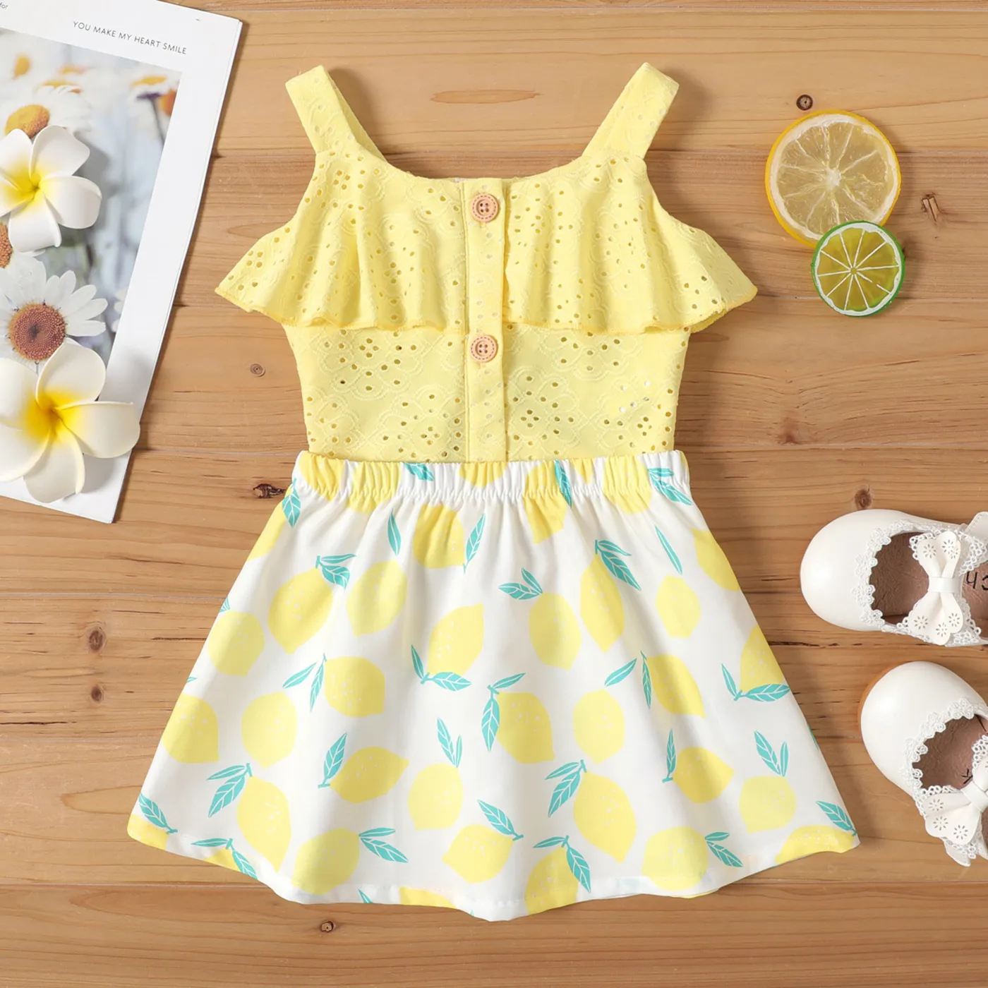 

2pcs Baby Girl Button Front Ruffle Trim Eyelet Cami Top and Allover Lemon Print Skirt Set