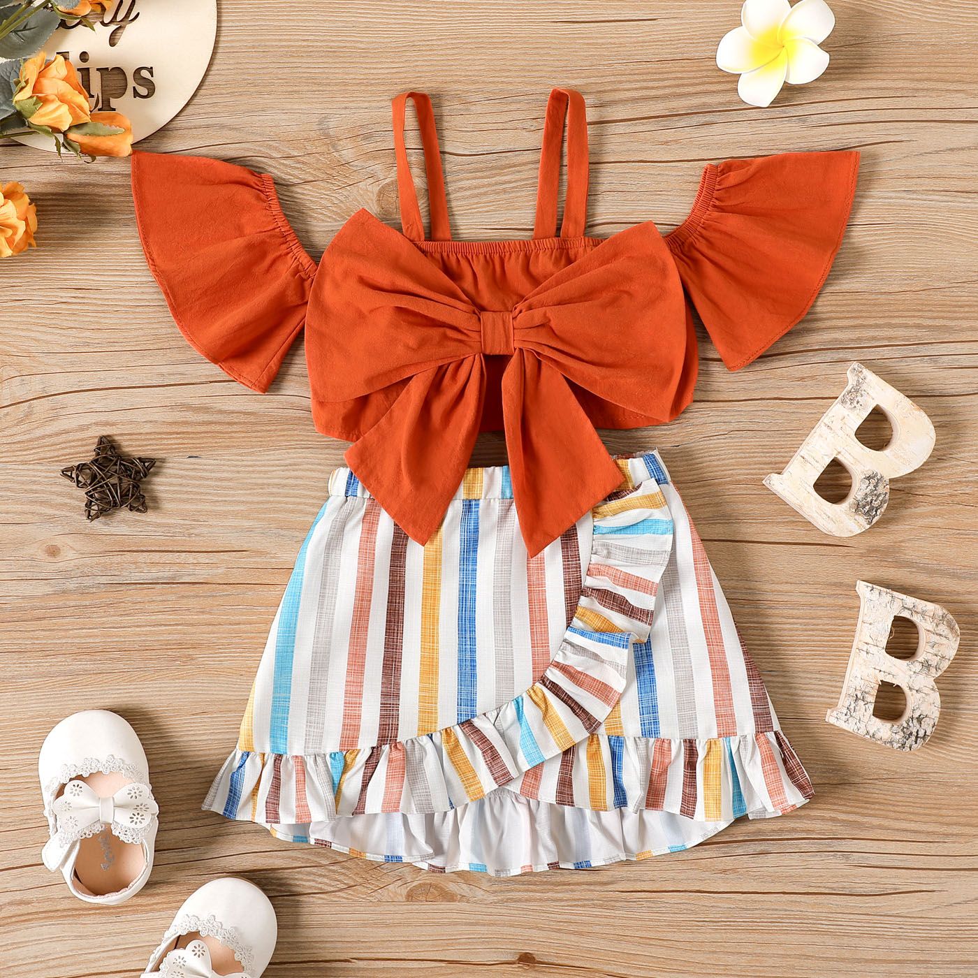 

2pcs Baby Girl 100% Cotton Bow Front Cold Shoulder Short-sleeve Crop Top and Striped Ruffle Trim Skirt Set