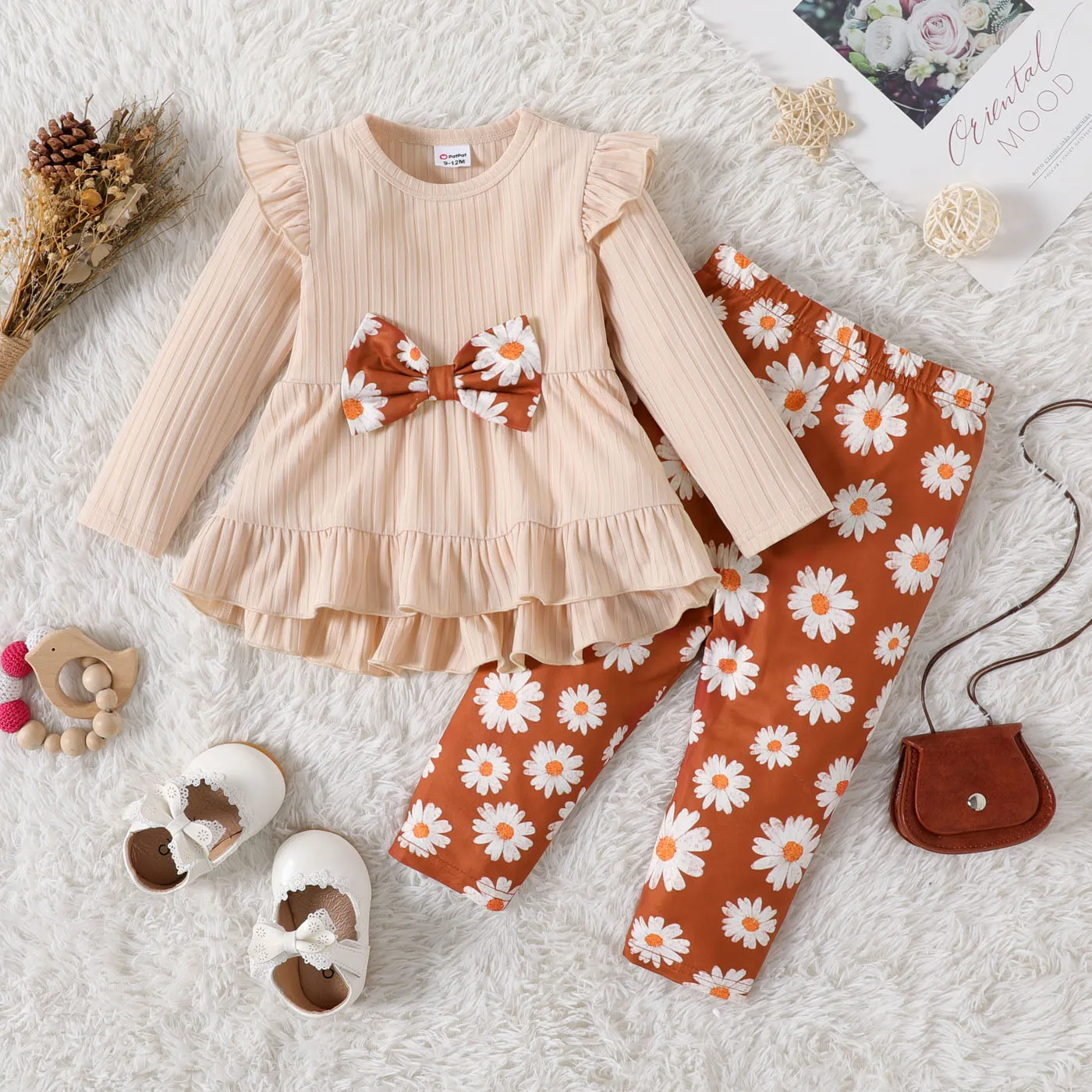 

2pcs Baby Girl Bow Front Solid Rib Knit Ruffle Trim Long-sleeve Top and Allover Daisy Floral Print Pants Set