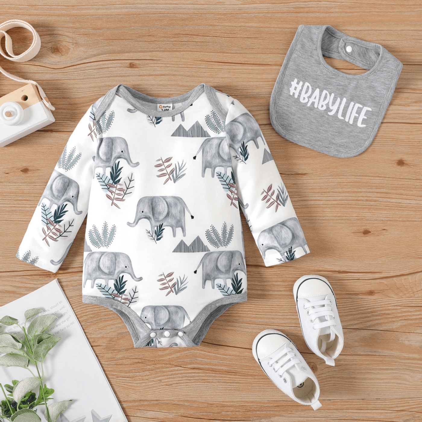 

2pcs Baby Boy Long-sleeve Allover Elephant Print Romper with Letter Print Bib Set