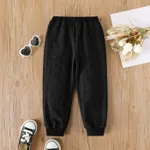 Pantalones elásticos con bordado de corazón de color sólido básico para niña pequeña Negro