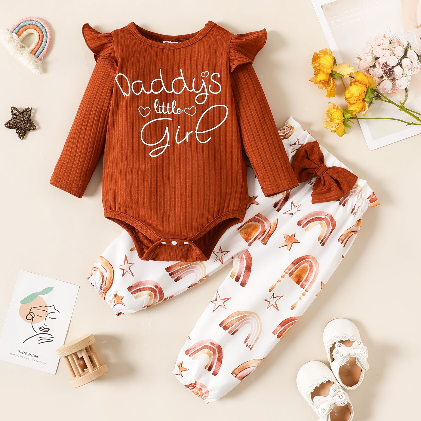 

2pcs Baby Girl Letter Print Rib Knit Ruffle Long-sleeve Romper and Bow Front Allover Rainbow & Star Print Pants Set
