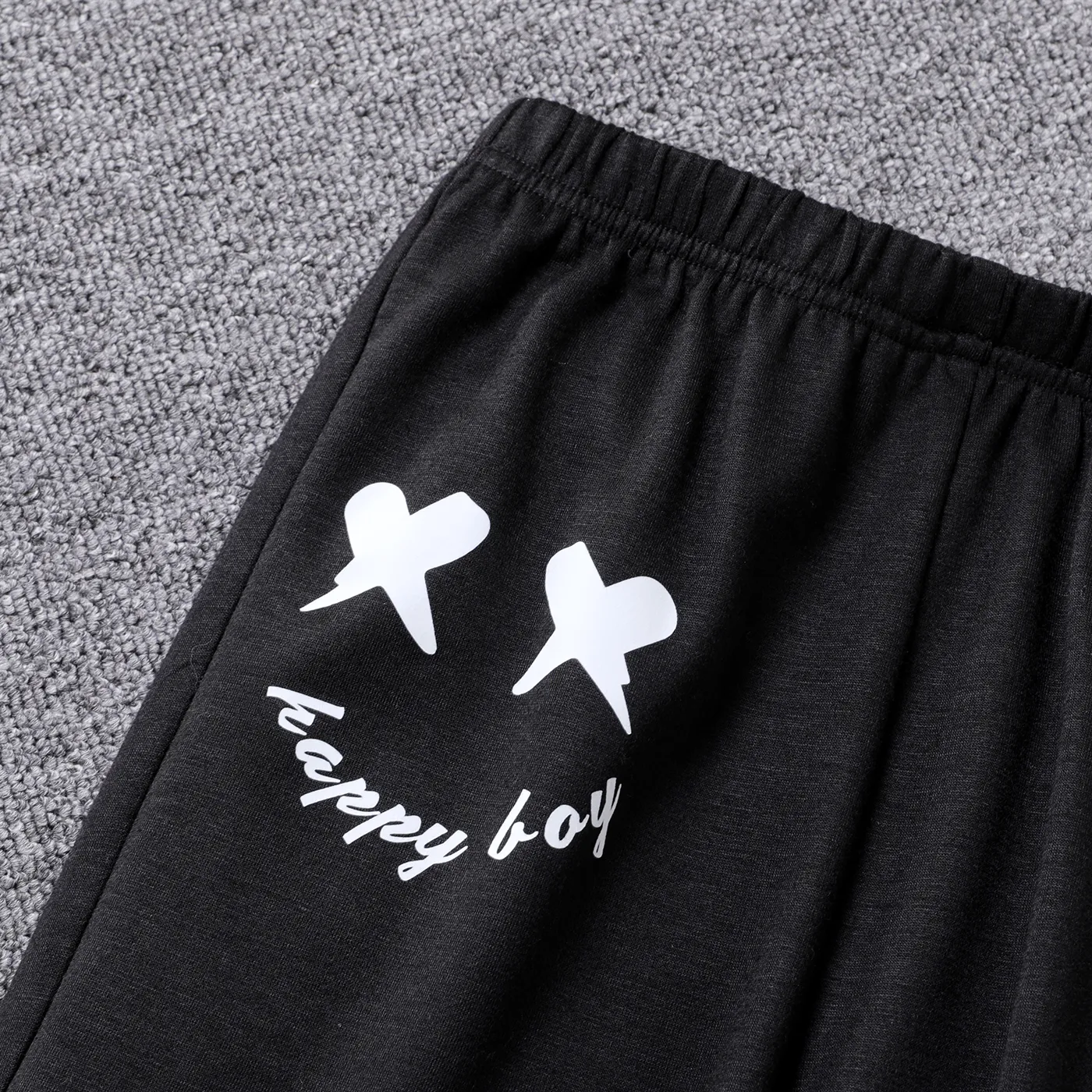 2pcs Kid Boy Face Graphic Print White Hoodie Sweatshirt and Black Pants Set BlackandWhite image 5
