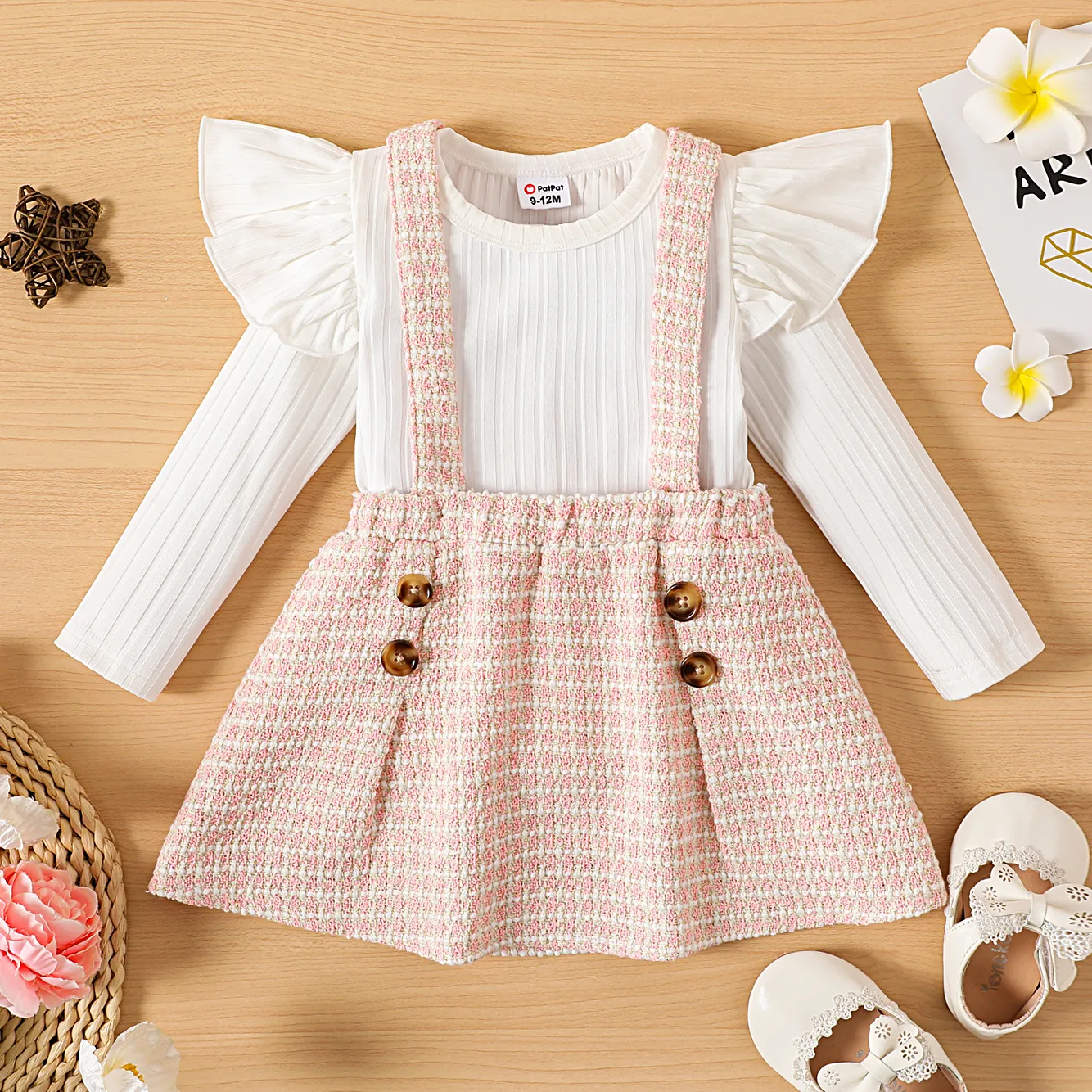 

2pcs Baby Girl Solid Rib Knit Ruffle Long-sleeve Top and Button Front Tweed Suspender Skirt Set