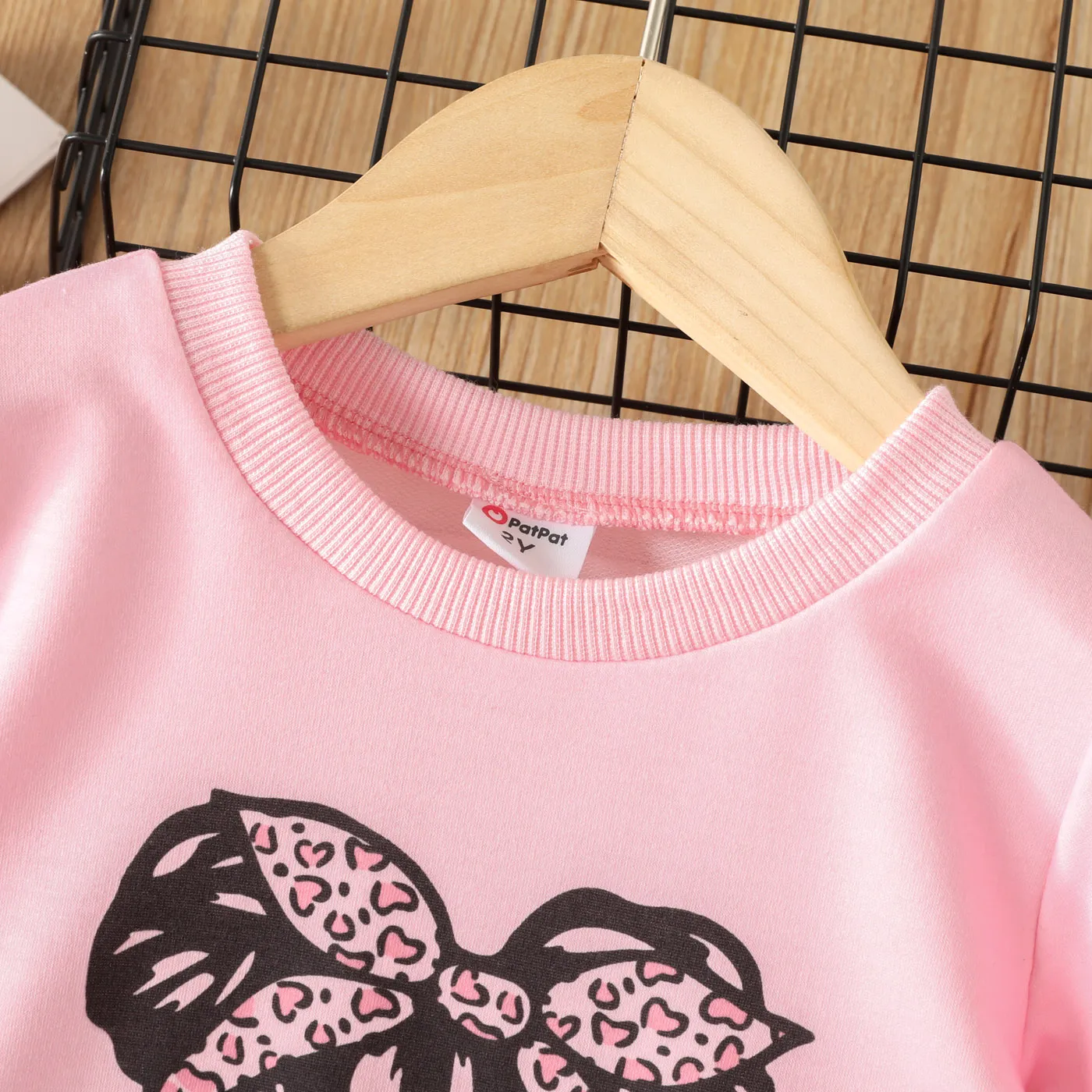 2pcs Toddler Girl Trendy Patchwork Ripped Denim Jeans and Figure Print Sweatshirt Set Pink image 3