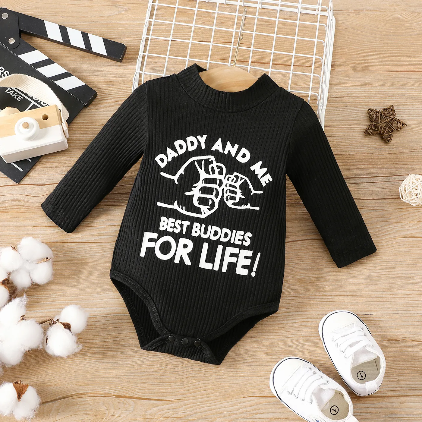 

Baby Boy/Girl Fist & Letter Print Black Ribbed Mock Neck Long-sleeve Romper