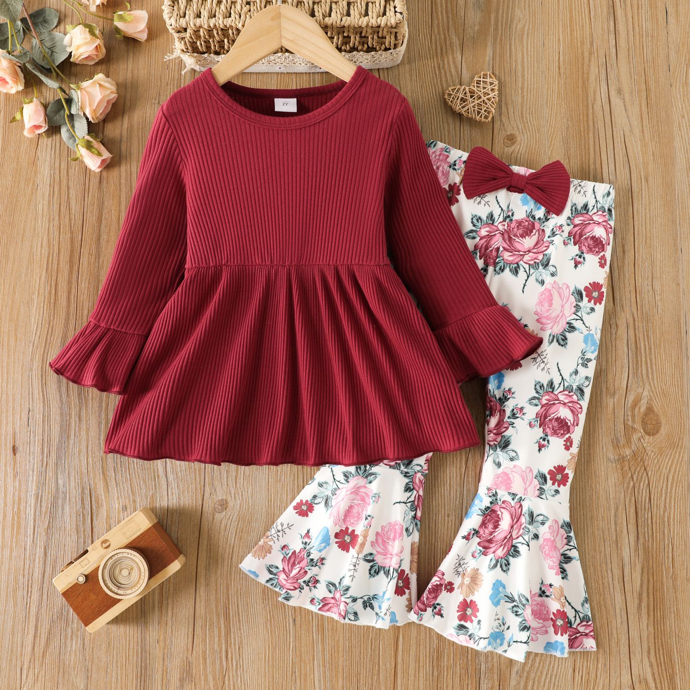 

2pcs Toddler Girl Sweet Ribbed Peplum Tee and Floral Print Flared Pants Set