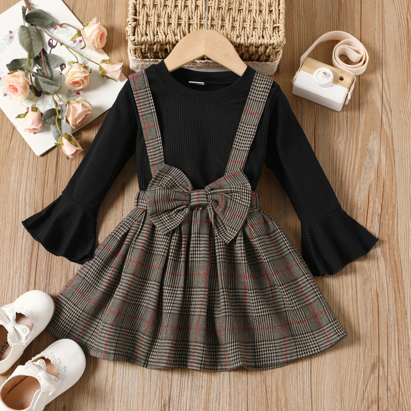 

2pcs Toddler Girl Preppy style Ribbed Bell sleeves Tee and Bows Plaid Suspender Skirt Set