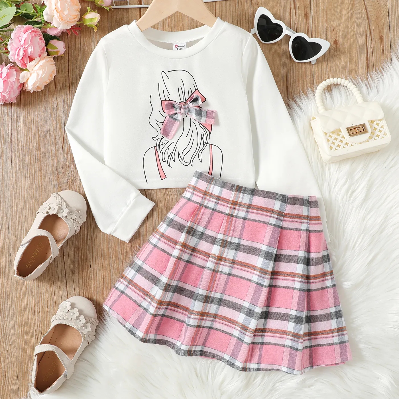 

2pcs Kid Girl Figure Print 3D Bowknot Design Long-sleeve Tee and Plaid Pleated Skirt Set