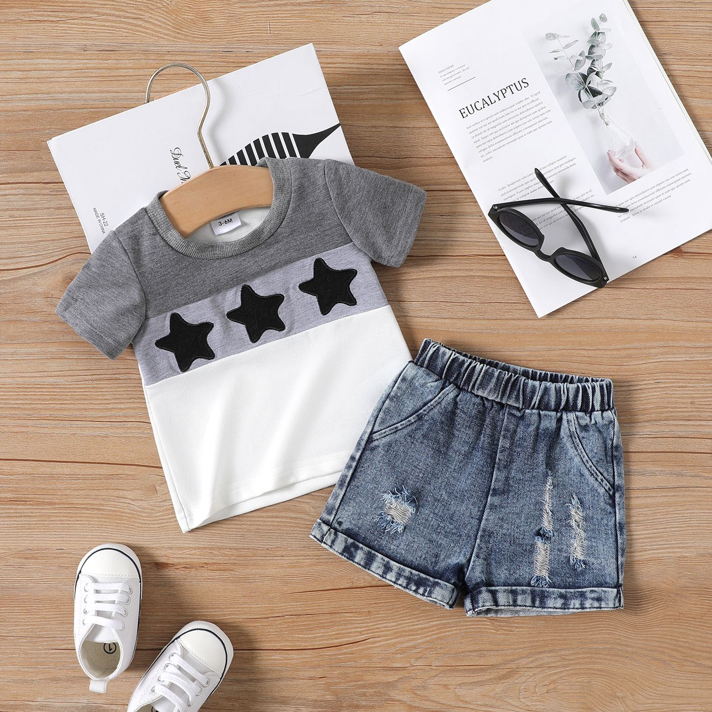 

2pcs Baby Boy 100% Cotton Ripped Denim Shorts and Star Graphic Colorblock Short-sleeve Tee Set