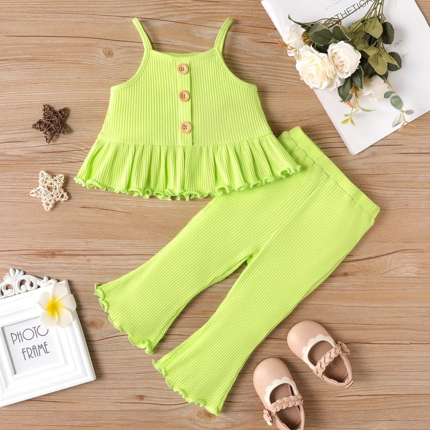 

2pcs Baby Girl Button Front Solid Cotton Ribbed Ruffle Hem Cami Top and Flared Pants Set