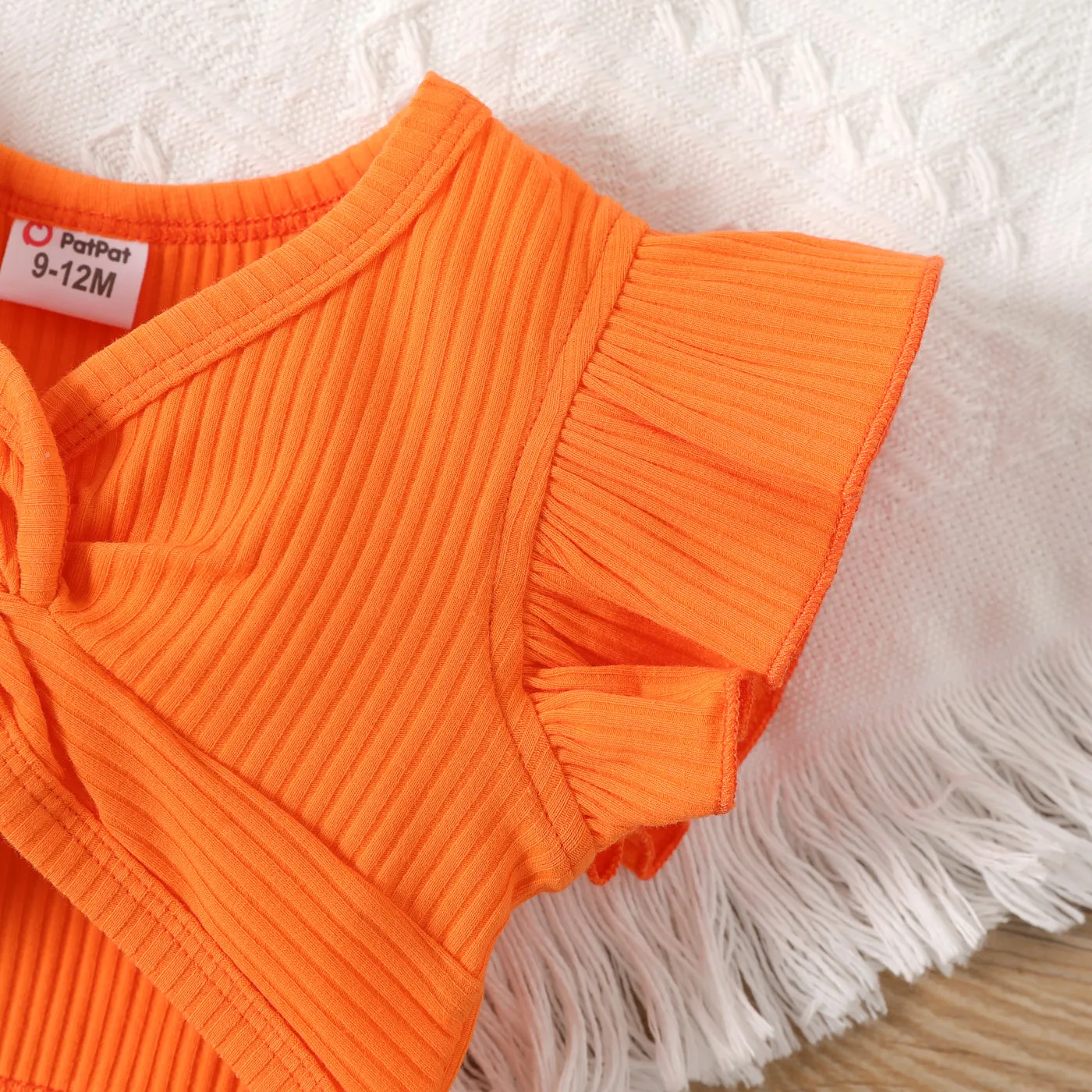2pcs Baby Girl Solid Cotton Ribbed Ruffle-sleeve Twist Knot Crop Top and Allover Fruit Print Skirt Set  image 4
