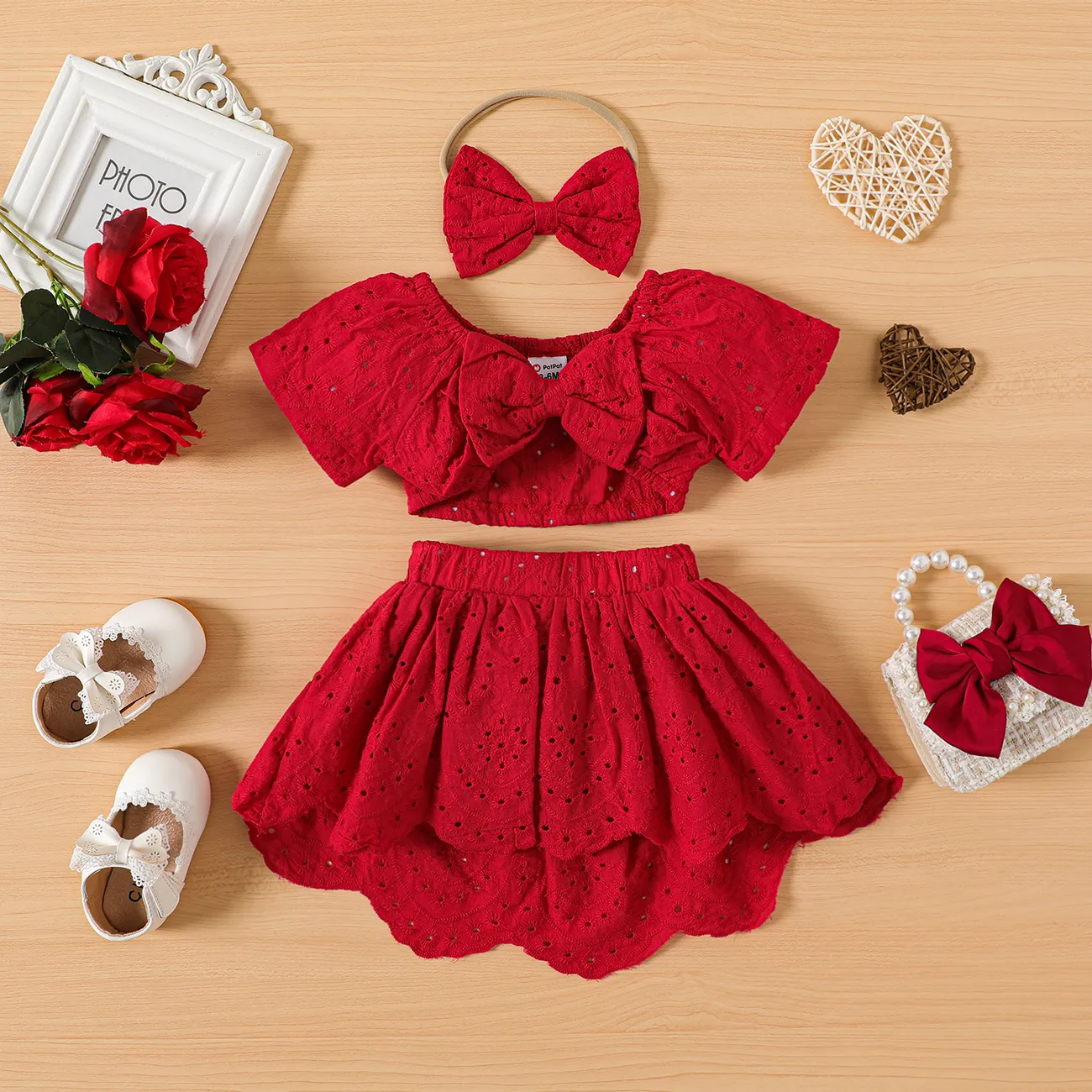 3pcs Baby Girl Solid Eyelet Embroidered Bow Front Short-sleeve Crop Top and High Low Hem Skirt & Headband Set Red big image 1