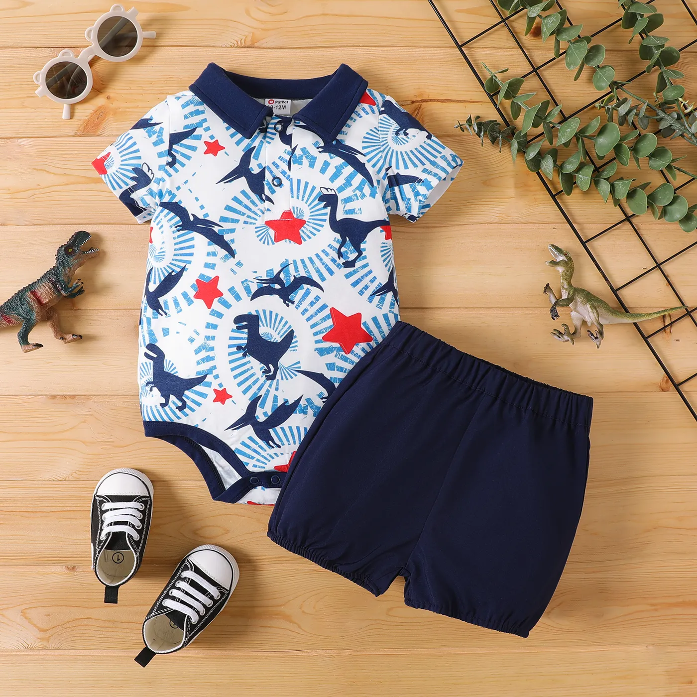 

2pcs Baby Boy Allover Dinosaur Print Contrast Collar Short-sleeve Naia™ Romper and Solid Shorts Set