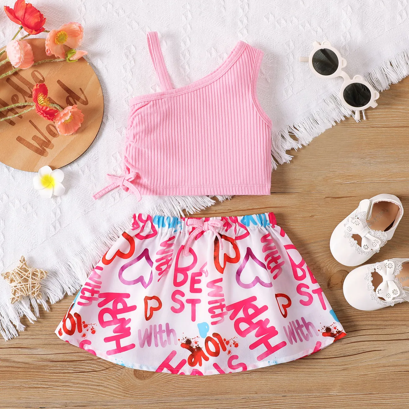 2pcs Baby Girl Cotton Ribbed One Shoulder Tank Crop Top and Allover Heart & Letter Print Skirt Set Pink big image 1