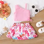2pcs Baby Girl Cotton Ribbed One Shoulder Tank Crop Top and Allover Heart & Letter Print Skirt Set Pink image 2