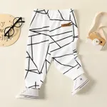 Baby Boy Allover Geo Print Naia™ Sweatpants White