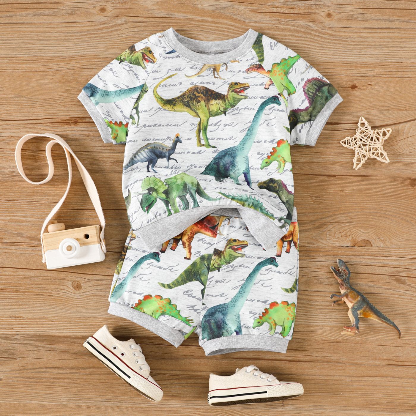 

2pcs Toddler Boy Allover Dinosaur Print Short-sleeve Tee and Shorts Set