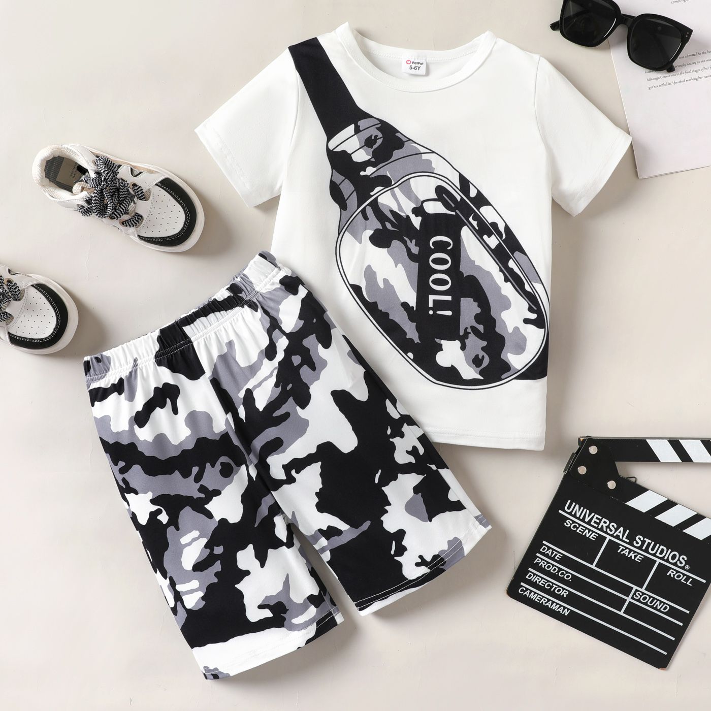

2pcs Kid Boy Camouflage Sling Bag Graphic Tee and Camouflage Shorts Set