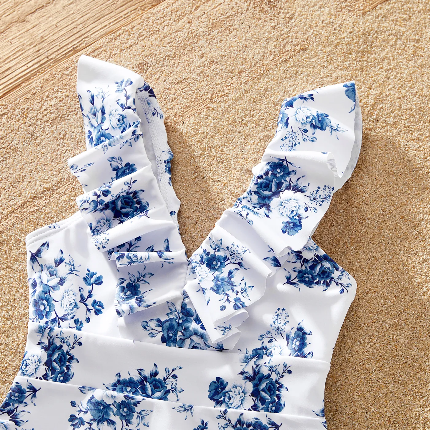Family Matching Allover Floral Print Ruffled One-piece Swimsuit or Swim Trunks Shorts blue  white image 6