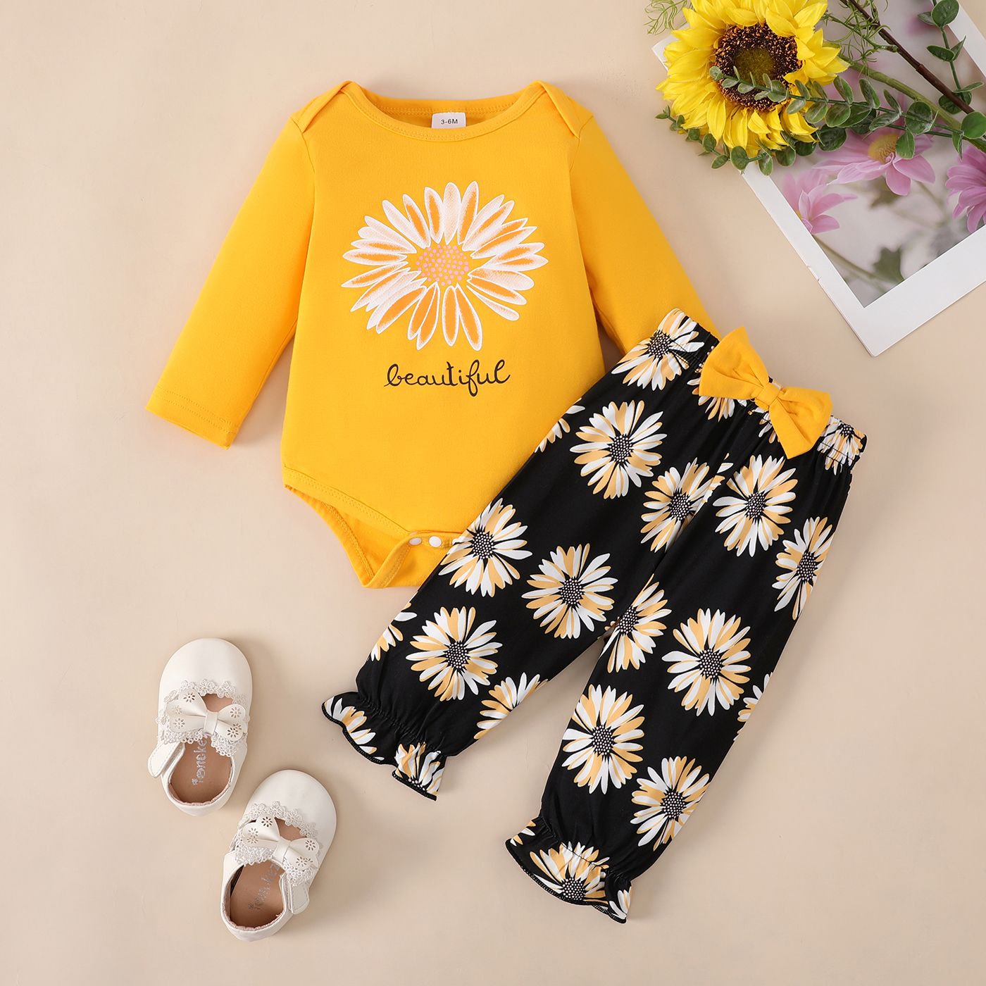

2pcs Baby Girl 95% Cotton Sunflower Print Long-sleeve Bodysuit and Ruffle Bow Decor Pants Set