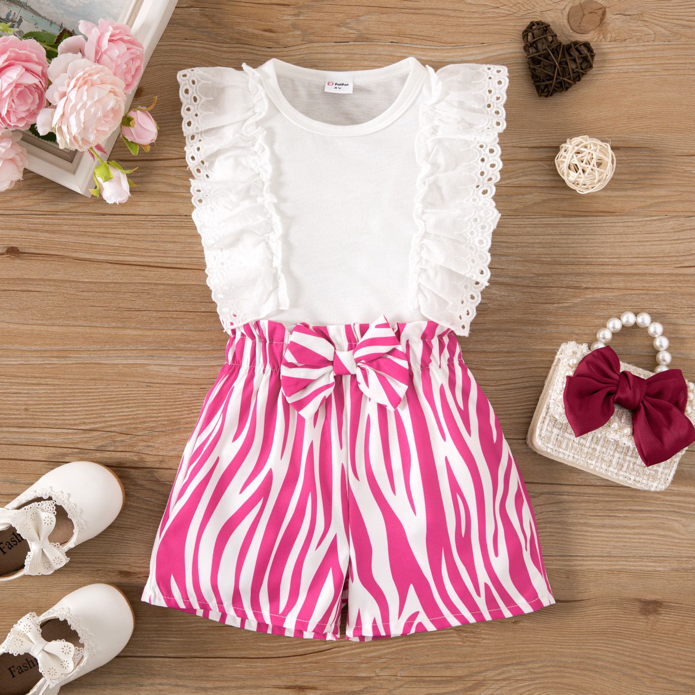 2pcs Toddler Girl Ruffled Top And Geo Pattern Bow Front Shorts Set