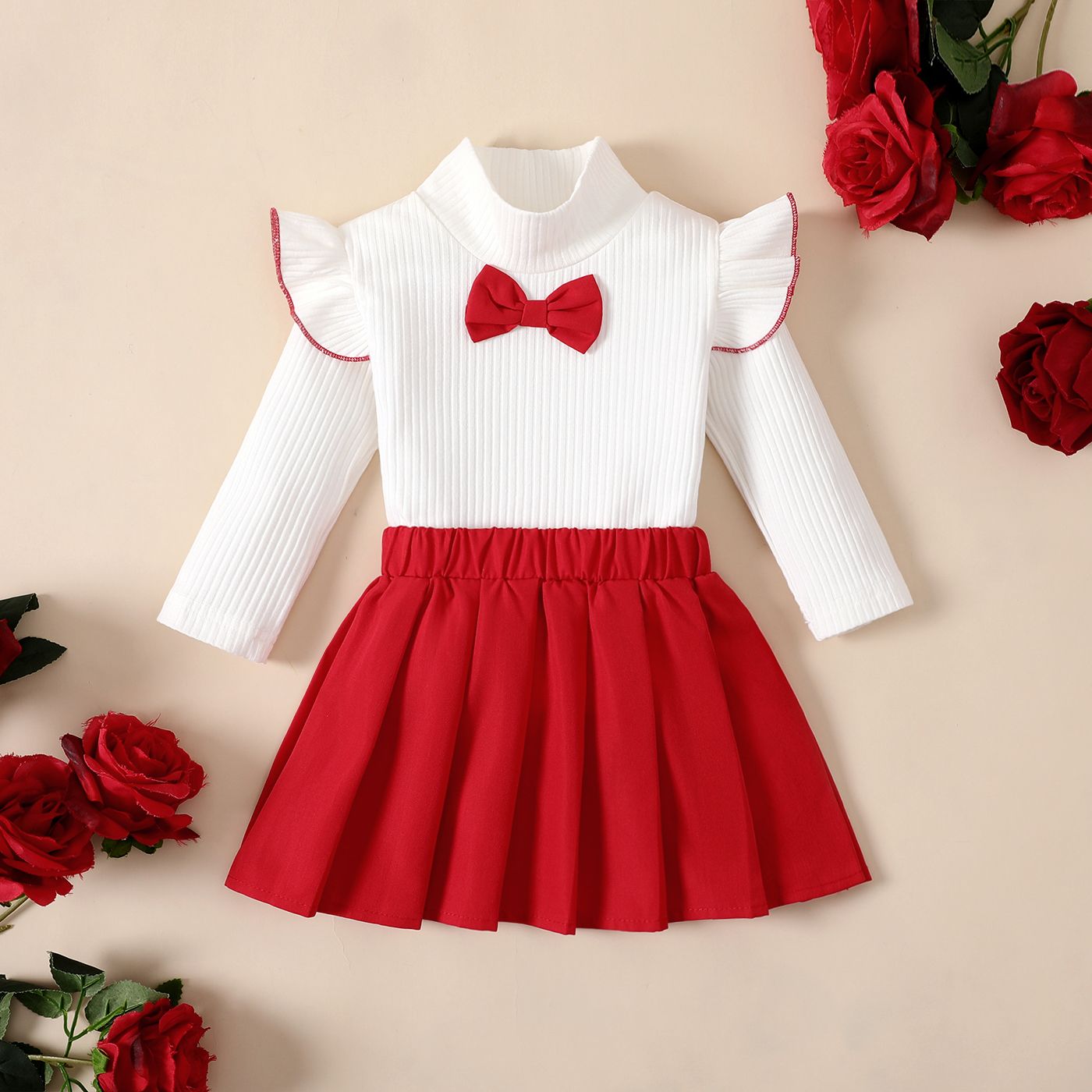 

2pcs Baby Girl Ribbed Bow Tie Ruffle Long-sleeve Top and Solid Pleating Skirt Set