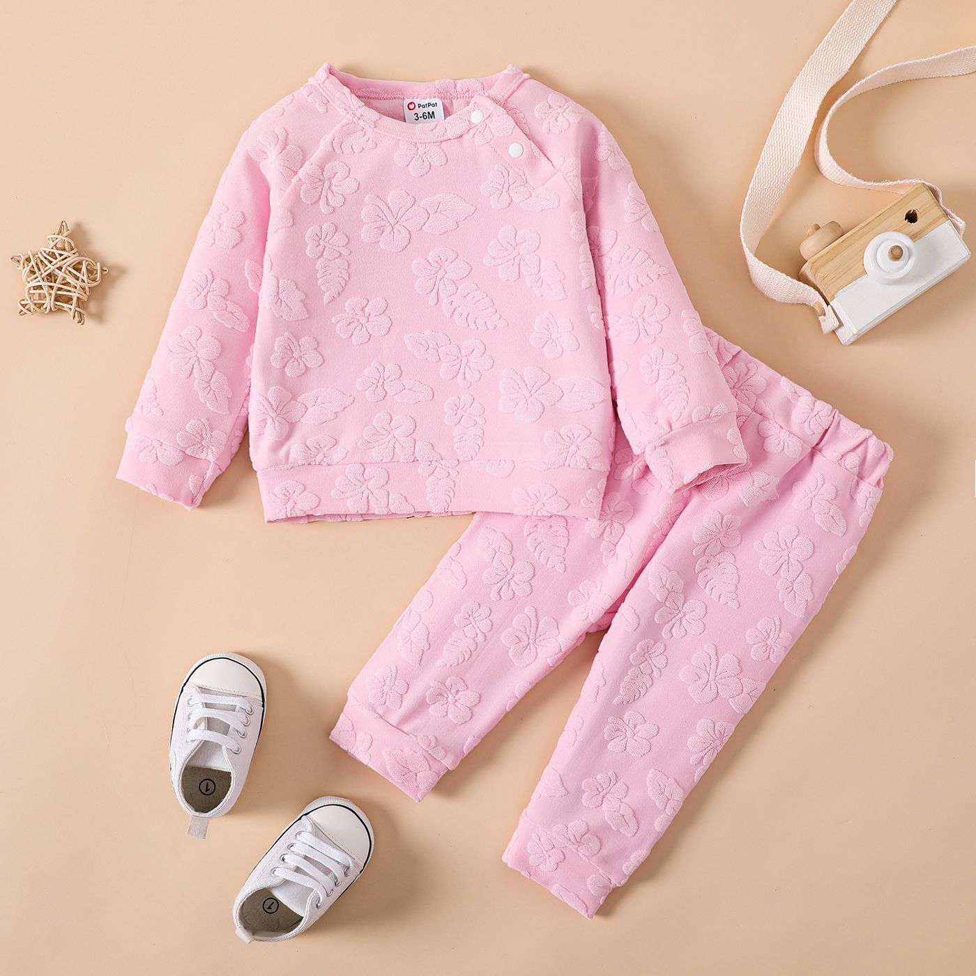 2pcs Baby Girl Solid Floral Embossed Long-sleeve Top and Pants Set
