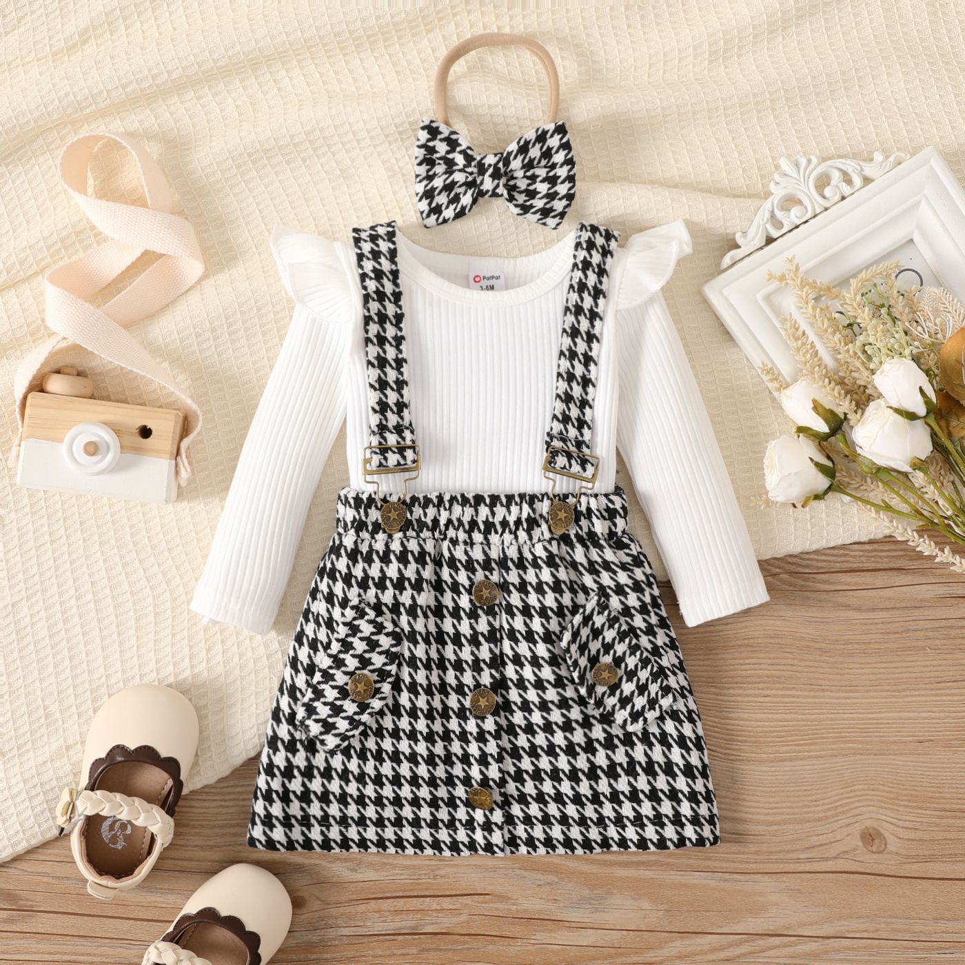 

3pcs Baby Girl 95% Cotton Ribbed Ruffle Long-sleeve Top and Houndstooth Buttons Front Strappy Skirt & Headband Set