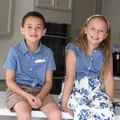 Family Matching 100% Cotton Blue Short-sleeve Shirts and Floral Print Ruffle Trim Spliced Cami Dresses Sets  image 4
