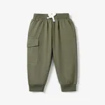 Pantalones cónicos informales lisos con lazo en la parte delantera para bebé niño/niña Verde