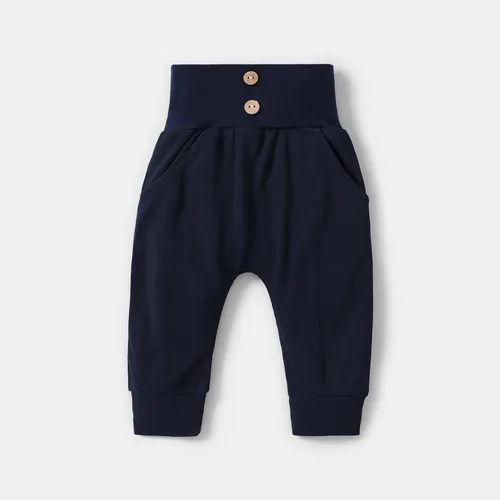 Pantalones de cintura alta con textura de gofre sólido para bebé niño/niña