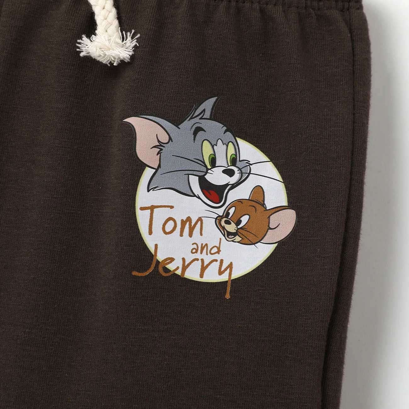 Tom and Jerry baby boy character graphic A romper or a pair of pants to wear with lighttan big image 1