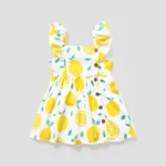 تصميم زر فتاة صغيرة بطبعة الليمون / فستان منقوش بأكمام رفرفة أبيض